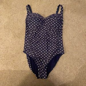 Navy blue polka dotted one piece bathing suit